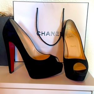 Black suede Christian Louboutin pumps